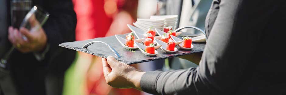 Caterer serving at a wedding