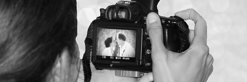 Photographer taking photo at wedding