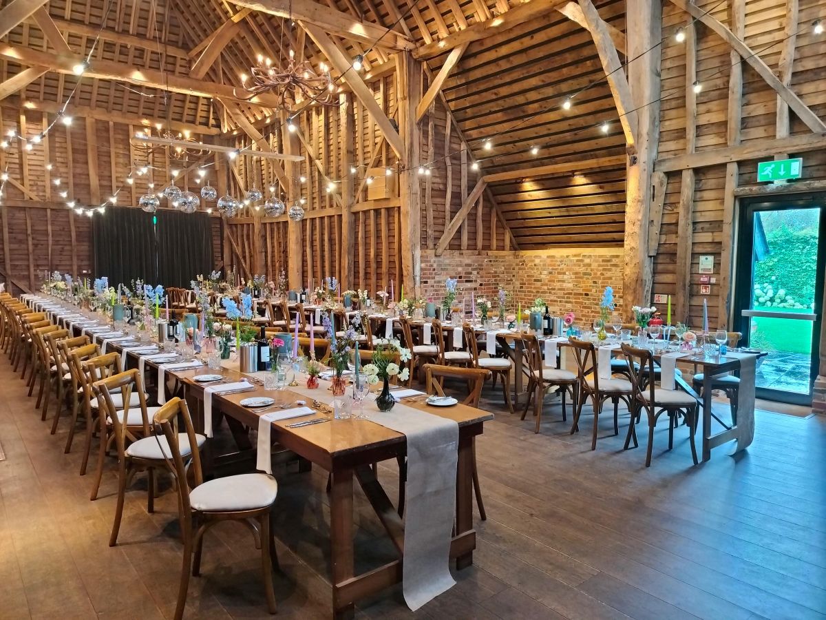 wedding breakfast table with disco balls hanging