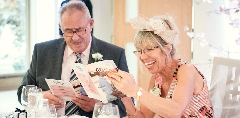 Wedding guests reading Wedition